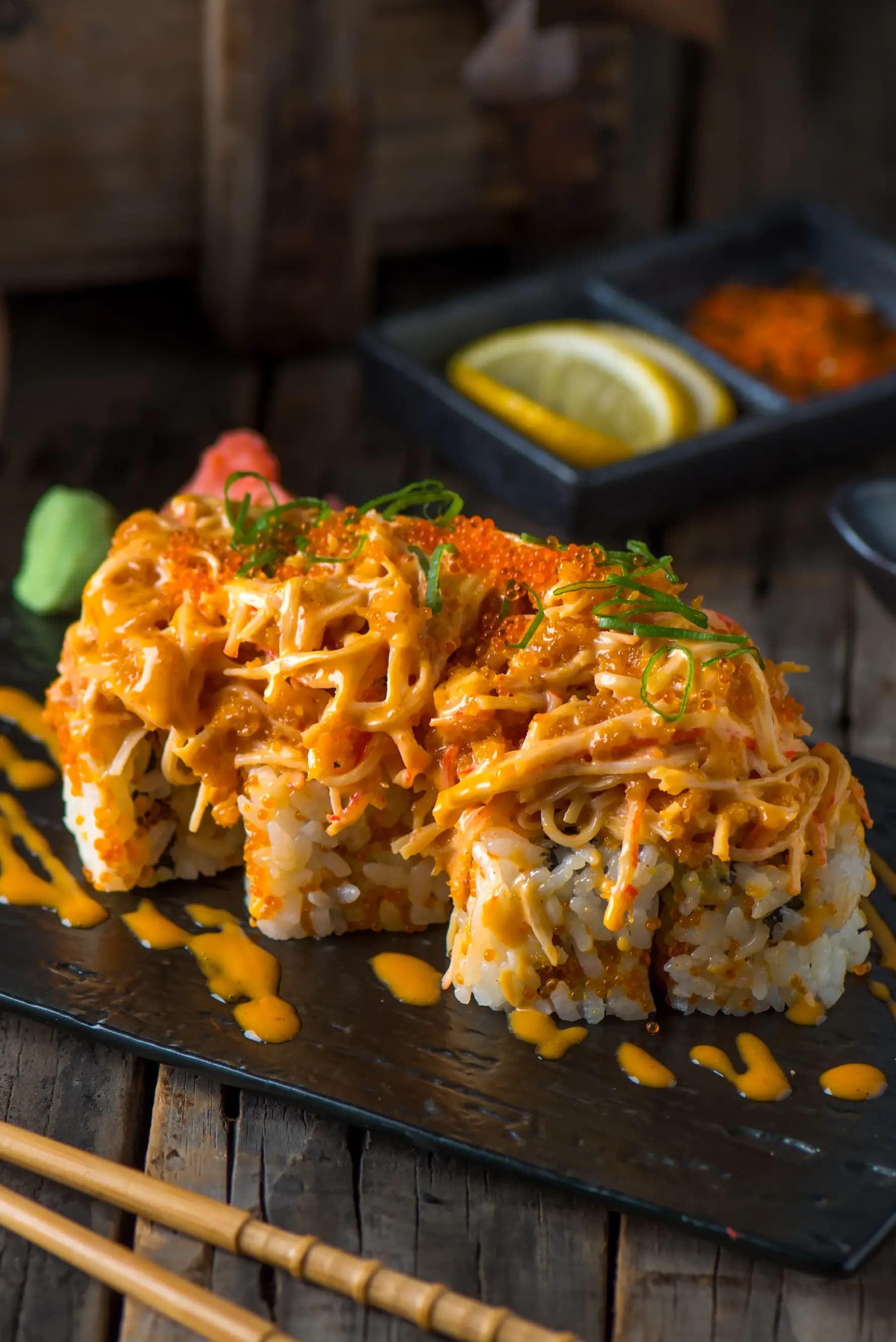 volcano-sushi-roll-served-cutting-board-isolated-wooden-background-side-view-sushi-roll